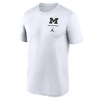 T-shirt Jordan Brand Michigan Wolverines pour homme avec logo principal et légende de performance blanc