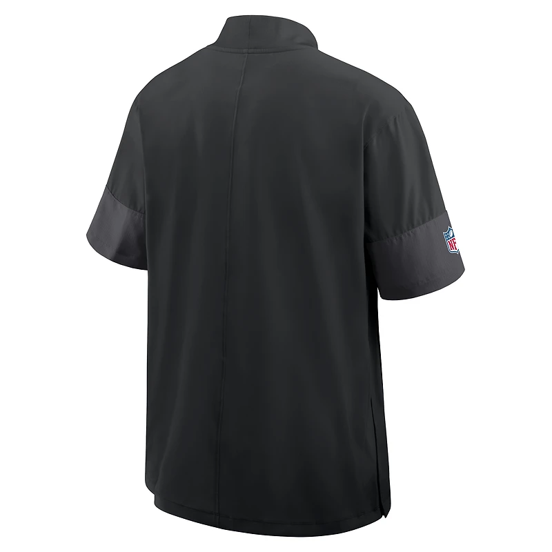 Veste d'entraîneur Nike Dri-FIT à manches courtes et fermeture éclair quart de tour, modèle Sideline, pour homme, noire, Minnesota Vikings.