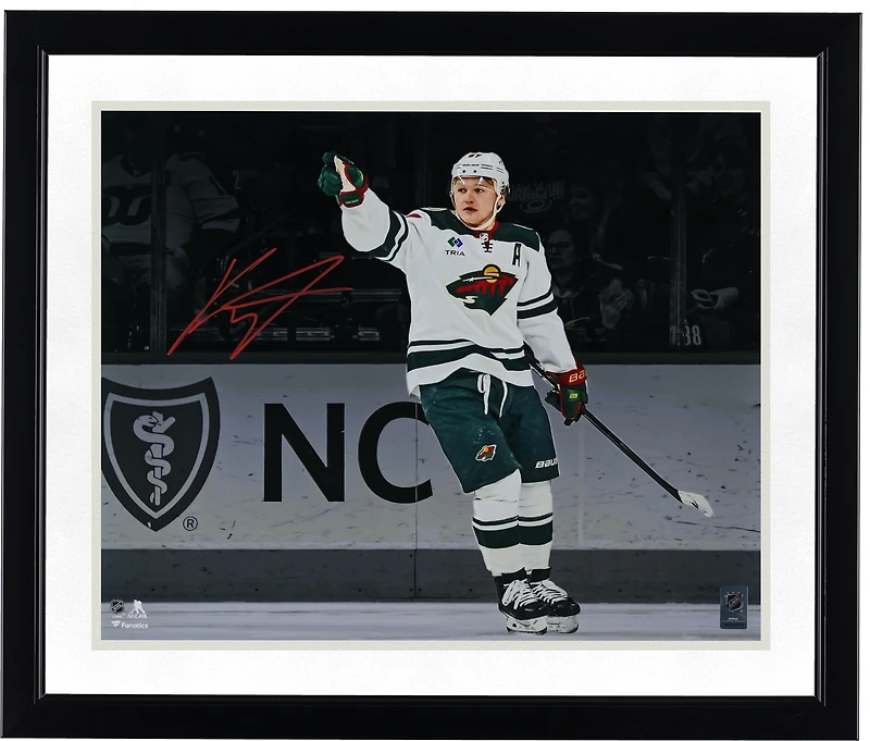 Kirill Kaprizov Minnesota Wild Autographed 16" x 20" White Jersey Celebrating Spotlight Photograph