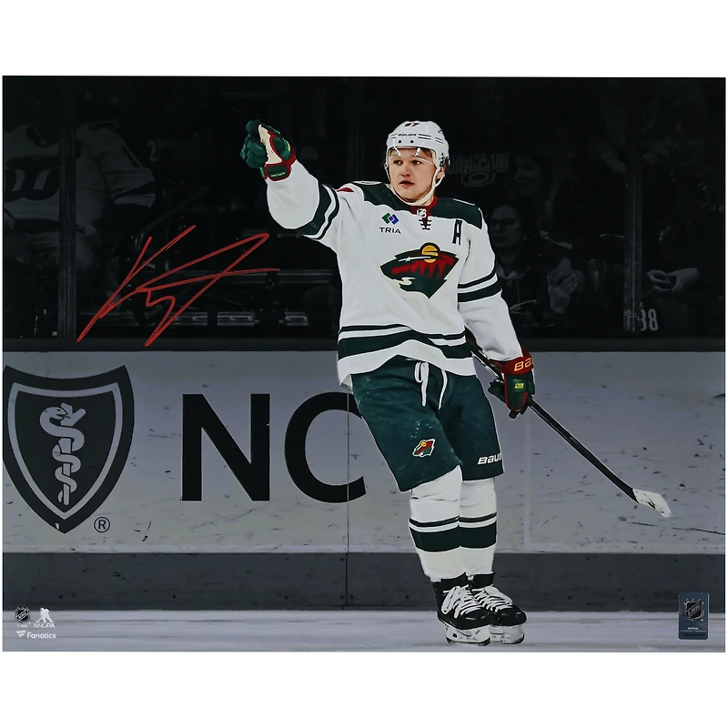 Kirill Kaprizov Minnesota Wild Autographed 16" x 20" White Jersey Celebrating Spotlight Photograph