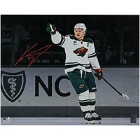 Kirill Kaprizov Minnesota Wild Autographed 16" x 20" White Jersey Celebrating Spotlight Photograph