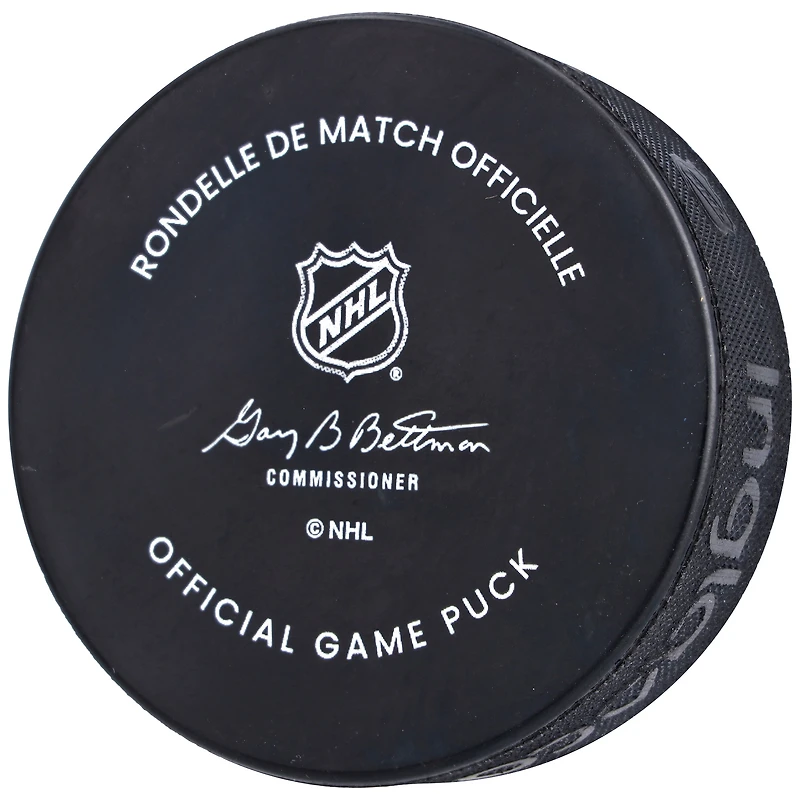 Rondelle de match officielle autographiée par Kirby Dach des Canadiens de Montréal avec l'inscription « Go Habs Go! »