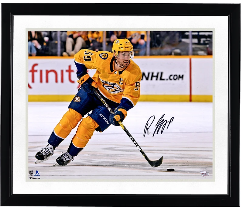 Roman Josi Nashville Predators Autographed 16" x 20" Gold Jersey Skating Photograph