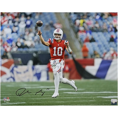 Drake Maye New England Patriots Autographed 16" x 20" Red Jersey Throwing Photograph