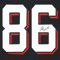 Maillot premium noir dédicacé par Jack Hughes des Devils du New Jersey