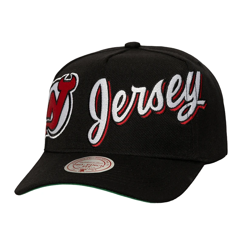 Casquette ajustable Mitchell & Ness noire New Jersey Devils Busted Logo Wordmark Pro Pinch pour homme