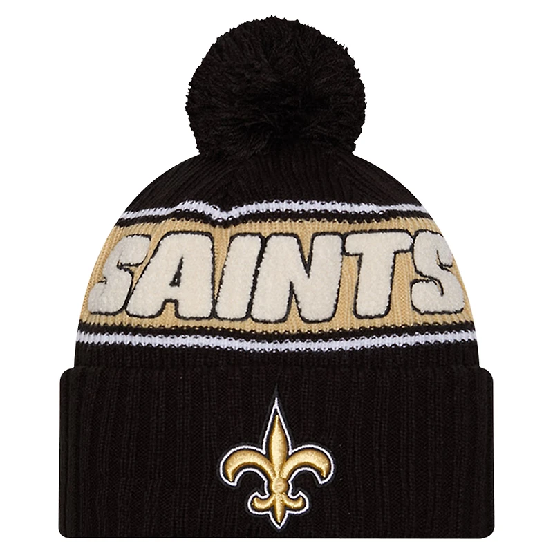 Bonnet en tricot à revers avec pompon New Era noir New Orleans Saints 2024 Sideline Sport pour homme