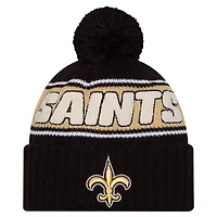 Bonnet en tricot à revers avec pompon New Era noir New Orleans Saints 2024 Sideline Sport pour homme