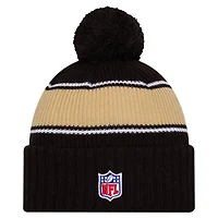 Bonnet en tricot à revers avec pompon New Era noir New Orleans Saints 2024 Sideline Sport pour homme