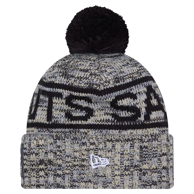 Men's New Era Black New Orleans Saints 2025 Sideline Cold Weather Cuffed Knit Hat with Pom