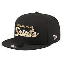 Casquette snapback New Era 9FIFTY noire pour homme, logo New Orleans Saints Core Team.