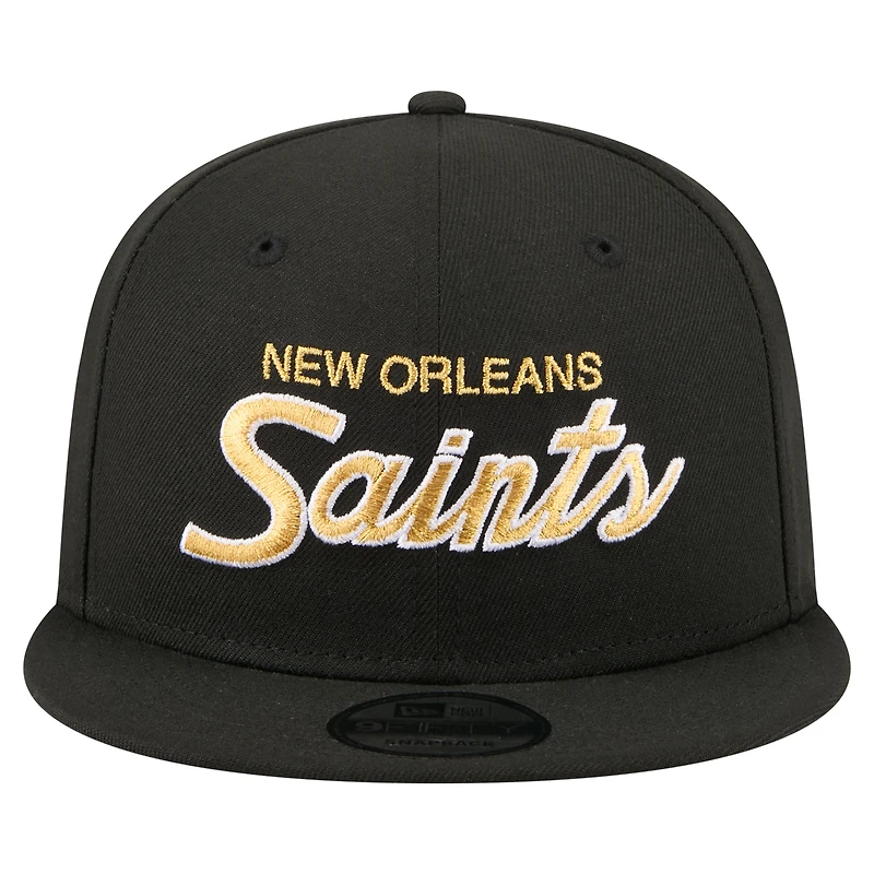 Casquette snapback New Era 9FIFTY noire pour homme, logo New Orleans Saints Core Team.
