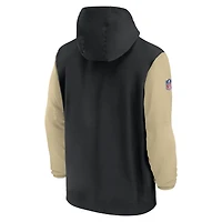 Men's Nike Black/Gold New Orleans Saints 2024/25 Sideline Pre-Game Player 1/2-Zip Hoodie Jacket