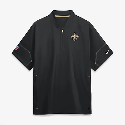 Veste d'entraîneur Nike noire pour homme, manches courtes, fermeture éclair au quart, New Orleans Saints Sideline.