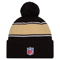 Youth New Era Black New Orleans Saints 2024 Sideline Sport Cuffed Knit Hat with Pom