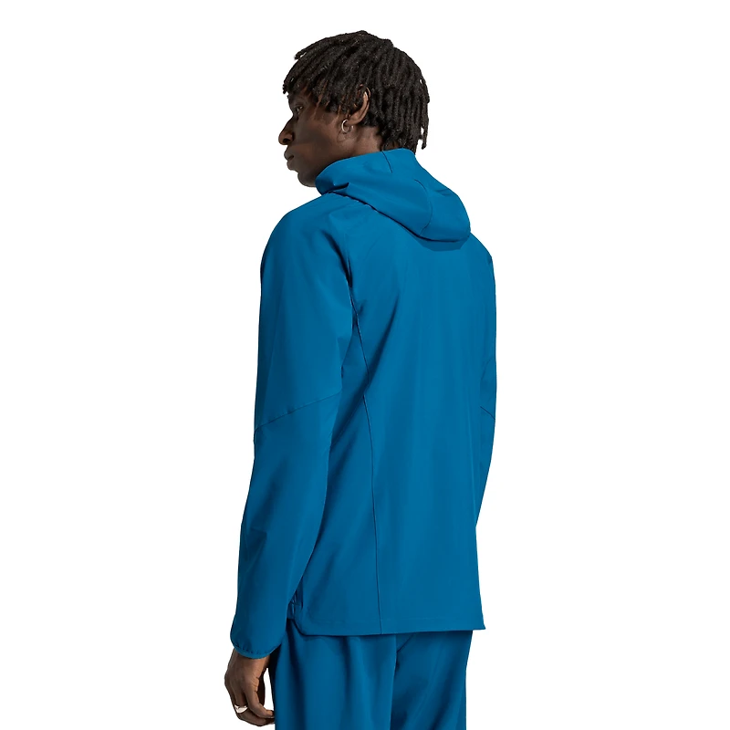 Coupe-vent à capuche zippé adidas bleu New York City FC Tiro Travel pour homme