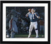 Phil Simms New York Giants Autographed 16" x 20" Super Bowl XXI vs. Broncos Spotlight Photograph with "S.B. XXI M.V.P." Inscription