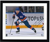 Casey Cizikas New York Islanders Autographed 16" x 20" Blue Jersey Skating with Puck Photograph