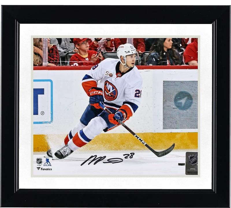New York Islanders Alexander Romanov Autographed 8" x 10" White Jersey with Puck Photograph