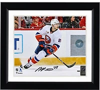 New York Islanders Alexander Romanov Autographed 8" x 10" White Jersey with Puck Photograph