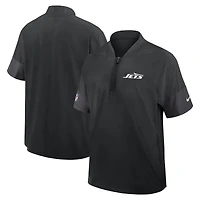 Veste d'entraîneur Nike noire pour homme, modèle New York Jets Sideline, manches courtes, fermeture éclair au quart, technologie Dri-FIT.
