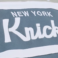 Veste à col zippé Mitchell & Ness bleue pour homme, modèle Thunderstorm des New York Knicks.