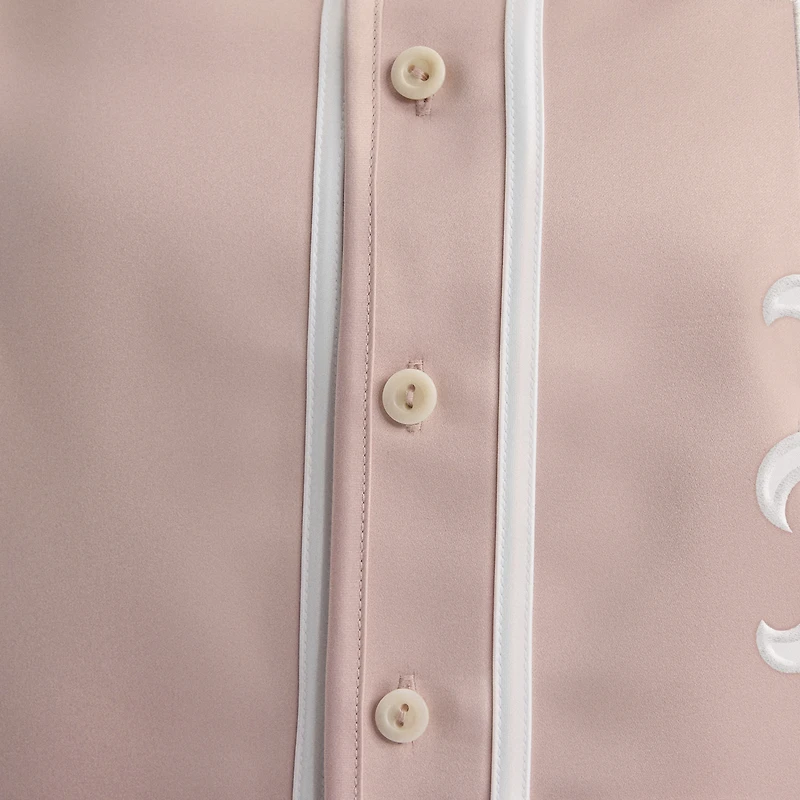 Haut de baseball en satin rose délavé Fanatics pour femme, modèle emblématique des Mets New York, entièrement boutonné.