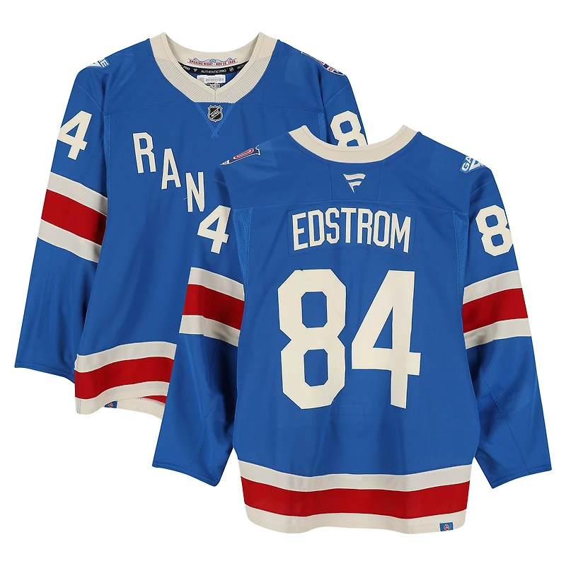Maillot bleu n° 84 des Rangers de New York, porté lors de plusieurs matchs entre le 20 octobre et le 16 novembre 2025 (série Centennial 1) par Adam Edstrom