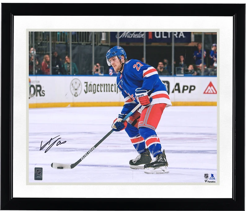 Adam Fox New York Rangers Autographed 16'' x 20'' Blue Jersey with Puck Photograph