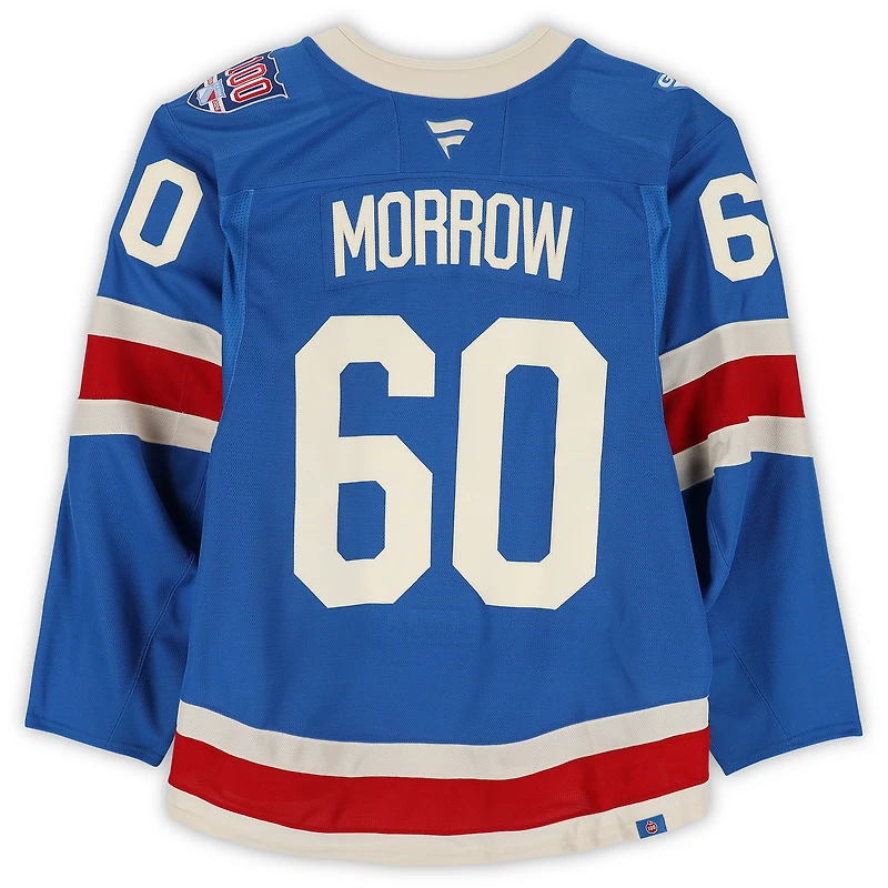 Maillot bleu du centenaire n° 60 porté par Scott Morrow, des Rangers de New York, lors du match d'entraînement contre les Hurricanes de la Caroline le 5 février 2026.