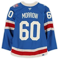 Maillot bleu du centenaire n° 60 porté par Scott Morrow, des Rangers de New York, lors du match d'entraînement contre les Hurricanes de la Caroline le 5 février 2026.