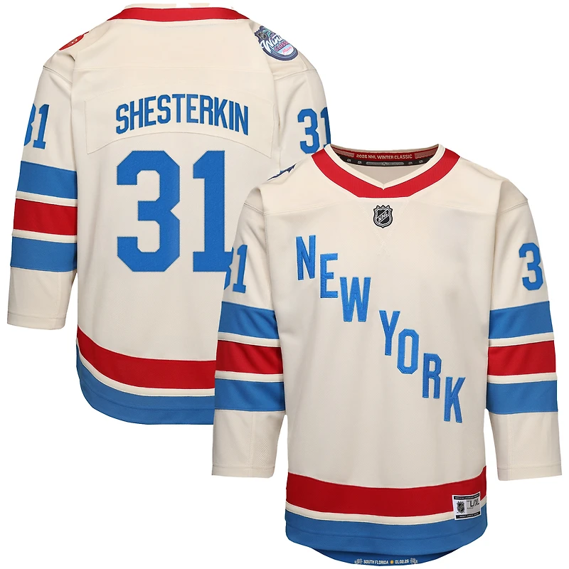 Maillot Premier Outerstuff Jeunesse Igor Shesterkin Blanc New York Rangers 2026 Classique Hivernale de la LNH