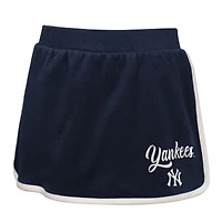 Ensemble polo et jupe-short Johnny pour filles bleu marine New York Yankees Base Trainer