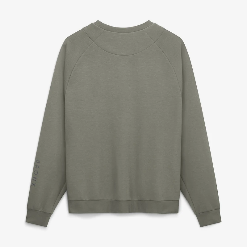Sweat-shirt raglan Nike Dri-FIT pour homme, motif New York Yankees, couleur olive.
