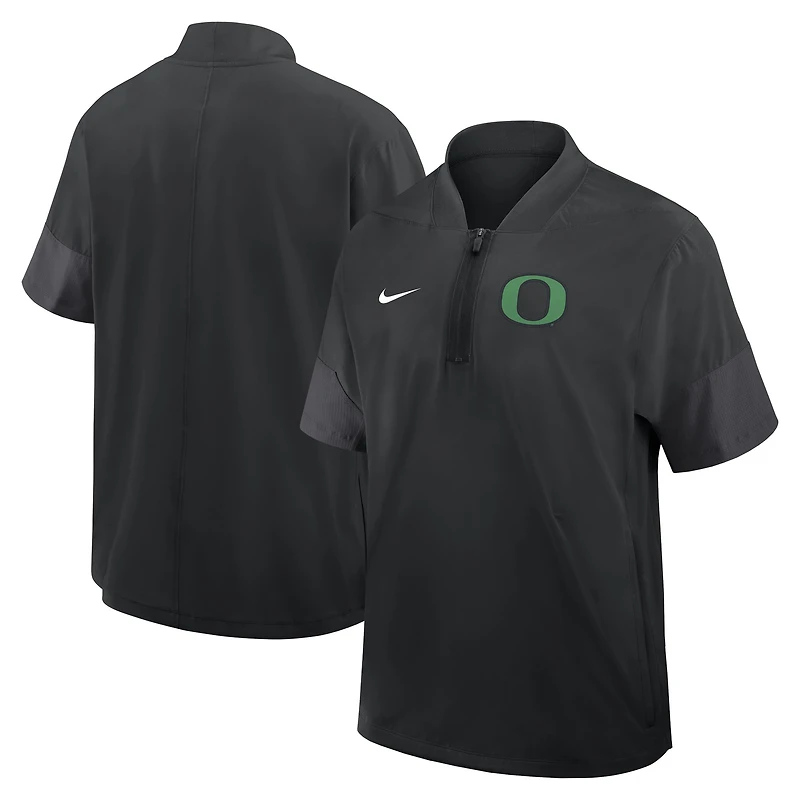 Veste d'entraîneur Nike Oregon Ducks 2025 Sideline noire pour homme, manches courtes, fermeture éclair au quart, technologie Dri-FIT