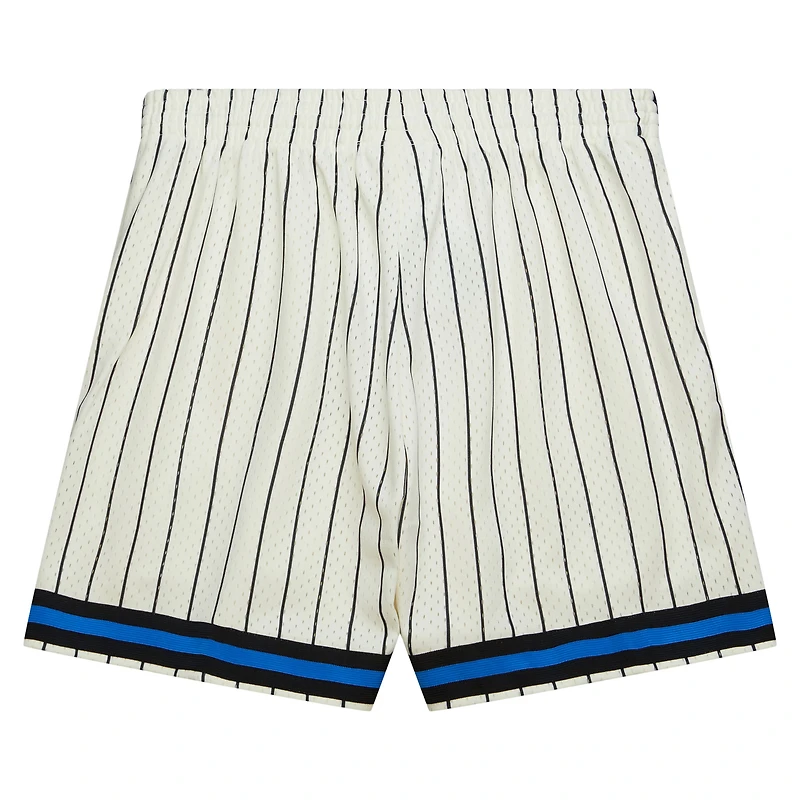 Mitchell & Ness Short Orlando Magic Swingman crème pour homme