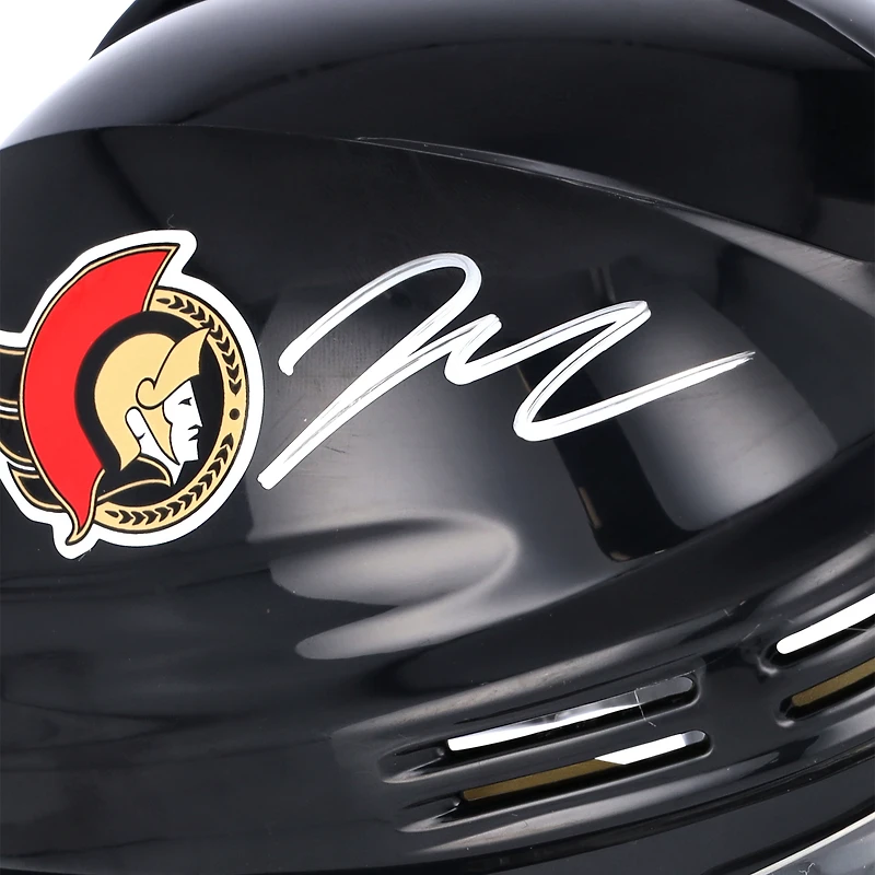 Casque mini noir autographié par Jake Sanderson des Sénateurs d'Ottawa