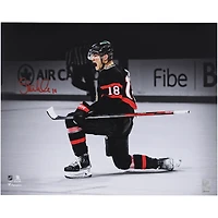 Tim Stutzle Ottawa Senators Autographed 16" x 20" Black Jersey Celebration Spotlight Photograph
