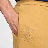Pantalon de survêtement Nike Paris Saint-Germain Tech Fleece coupe ample et ourlet ouvert pour homme, doré