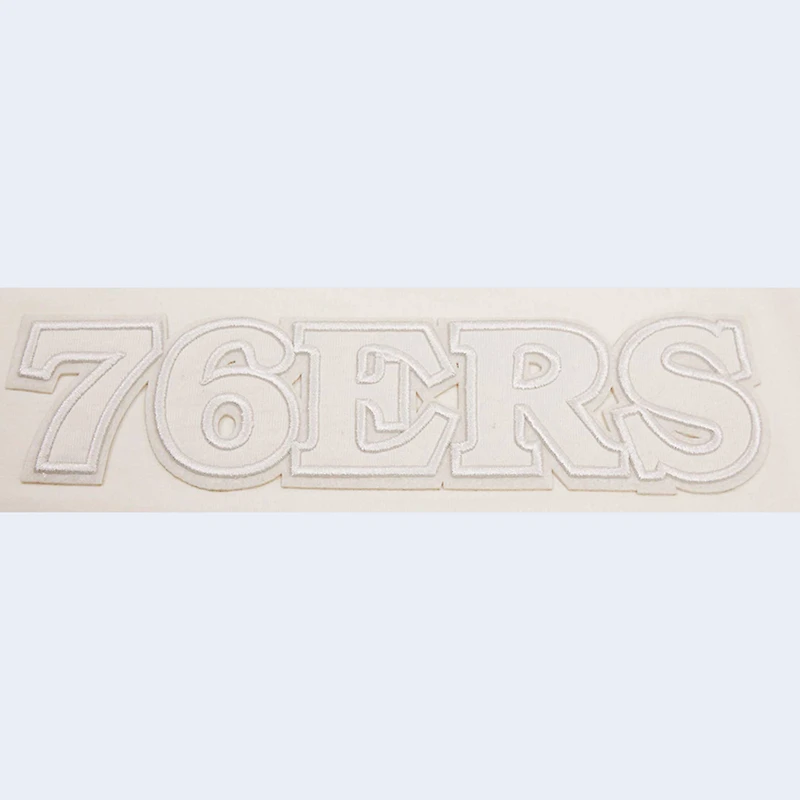 T-shirt court neutre Pro Standard Philadelphia 76ers crème pour femme