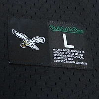 Haut en maille noir pour homme avec nom et numéro de joueur retraité des Philadelphia Eagles, Mitchell & Ness Randall Cunningham