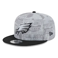 Casquette Snapback 9FIFTY New Era pour hommes des Philadelphia Eagles Inspire Change gris/noir