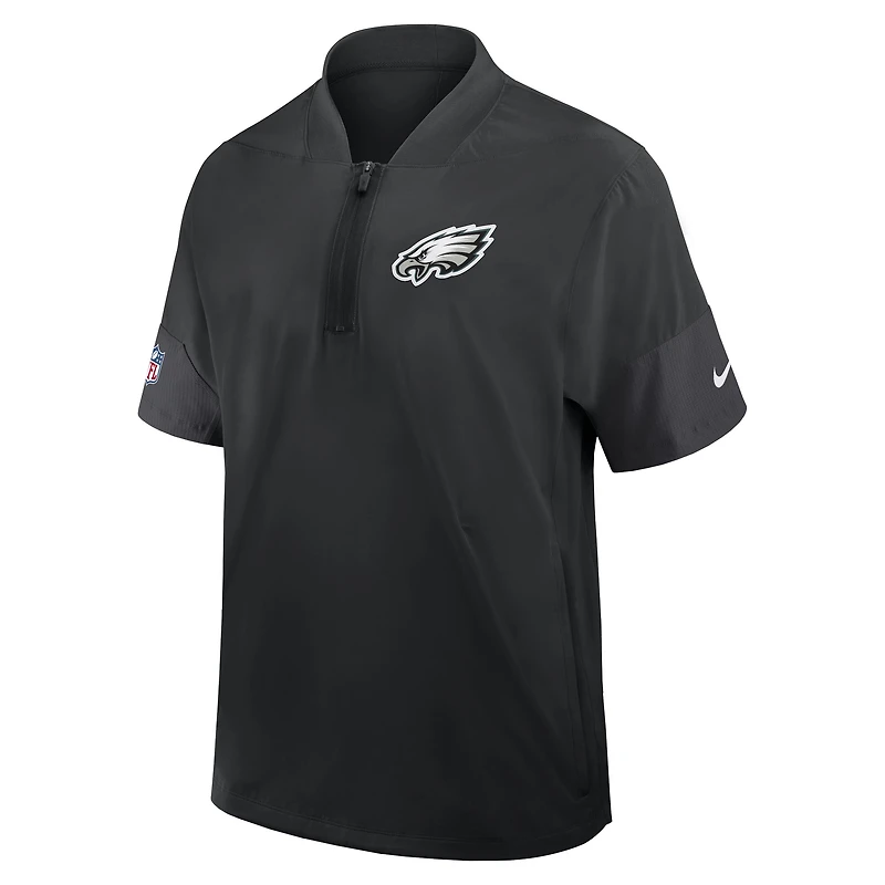 Veste d'entraîneur Nike noire à manches courtes et fermeture éclair quart de tour pour homme des Philadelphia Eagles