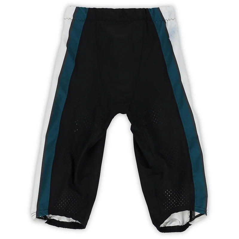 Pantalon blanc Nike porté par Saquon Barkley lors du match des Eagles de Philadelphie contre les Giants de New York le 9 octobre 2025