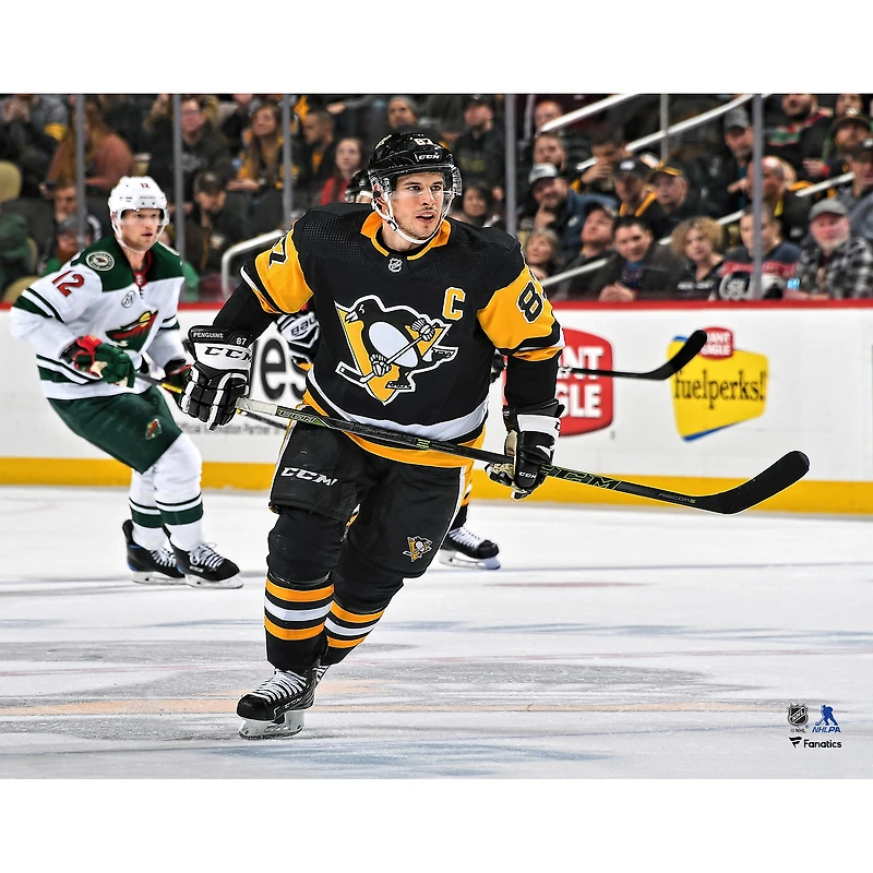 Sidney Crosby Pittsburgh Penguins Unsigned Black Jersey Skating Photograph