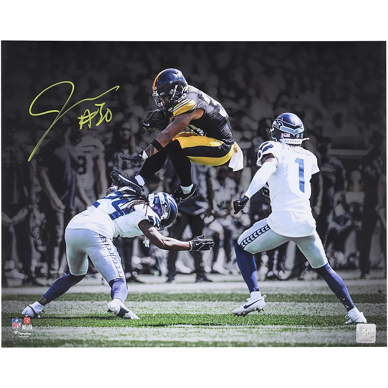 Jaylen Warren Pittsburgh Steelers Autographed 16" x 20" Leaping over Defender Spotlight Photograph