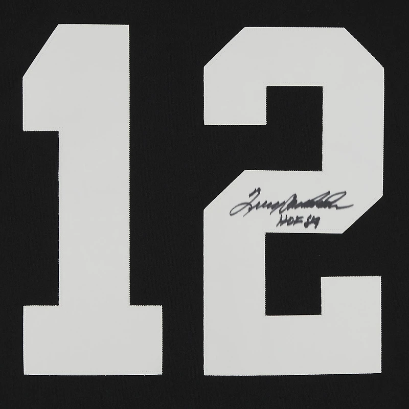 Maillot authentique noir Mitchell & Ness autographié par Terry Bradshaw des Steelers de Pittsburgh, avec inscription « HOF 89 ».