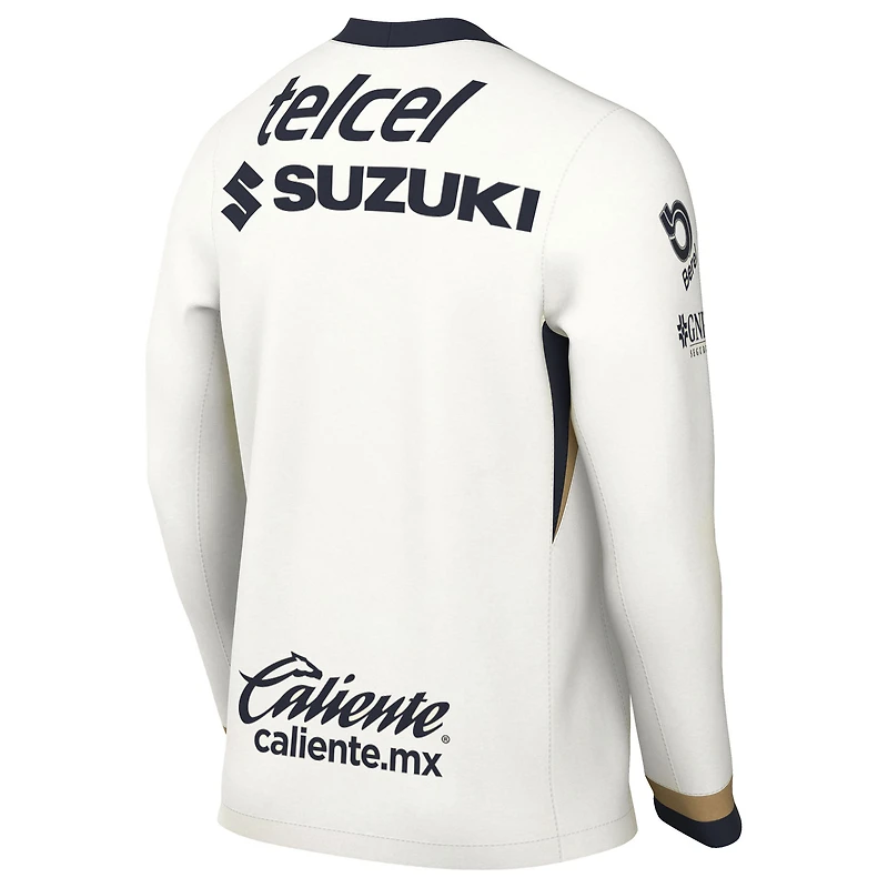 Maillot à manches longues Nike crème Pumas Domicile 2025/26 pour homme