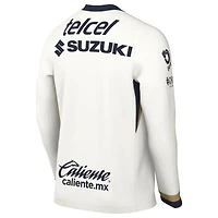 Maillot à manches longues Nike crème Pumas Domicile 2025/26 pour homme