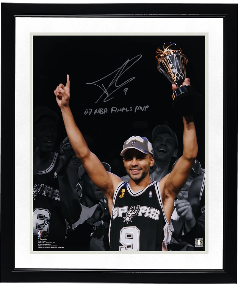 Tony Parker San Antonio Spurs Autographed 16" x 20" Holding 2007 NBA Finals MVP Trophy Spotlight Photograph with "07 NBA Finals MVP" Inscription